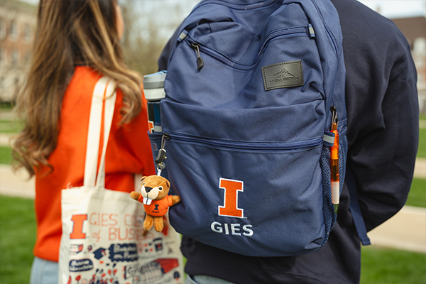 Gies Branded Backpack and Keychain on Student