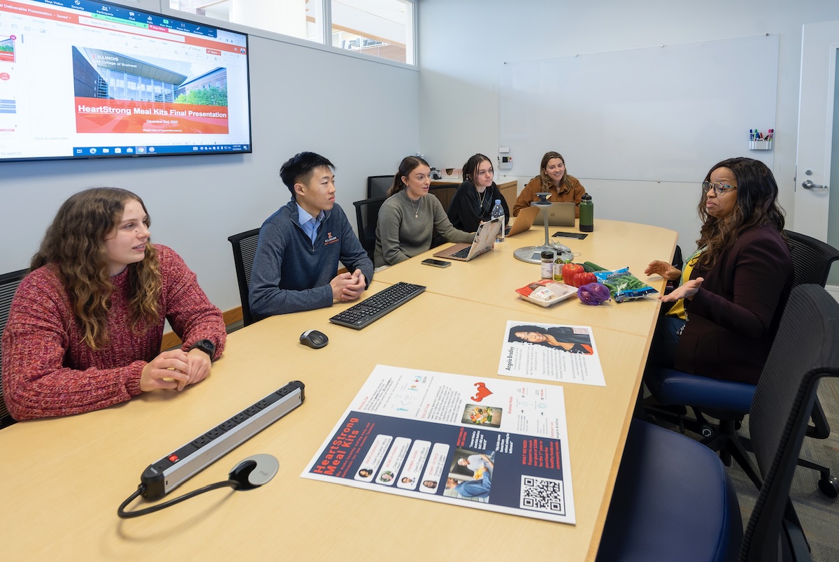 Gies Business students presenting their final project