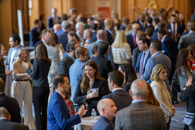 Crowd networking at Spring Luncheon 2026