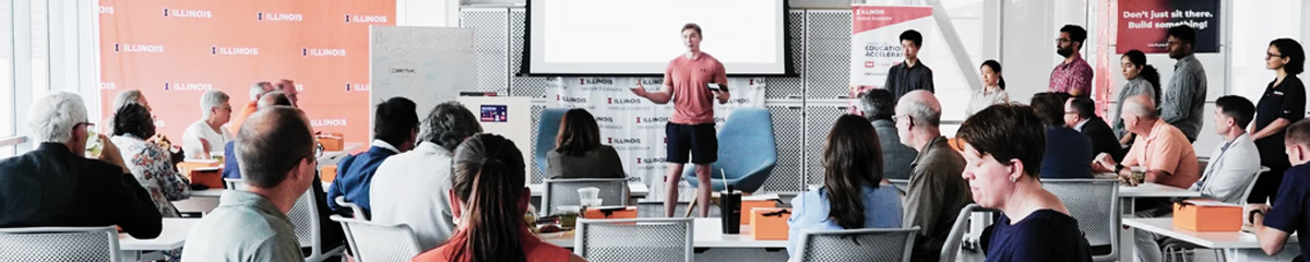 iVenture Students Giving a Presentation in Front of a Large Audience