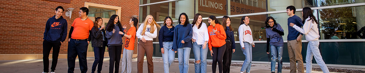 Several Gies Undergraduate Students Talking Outside Business Instructional Facility