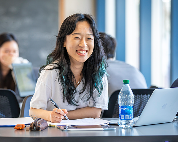 university of illinois student studying at table